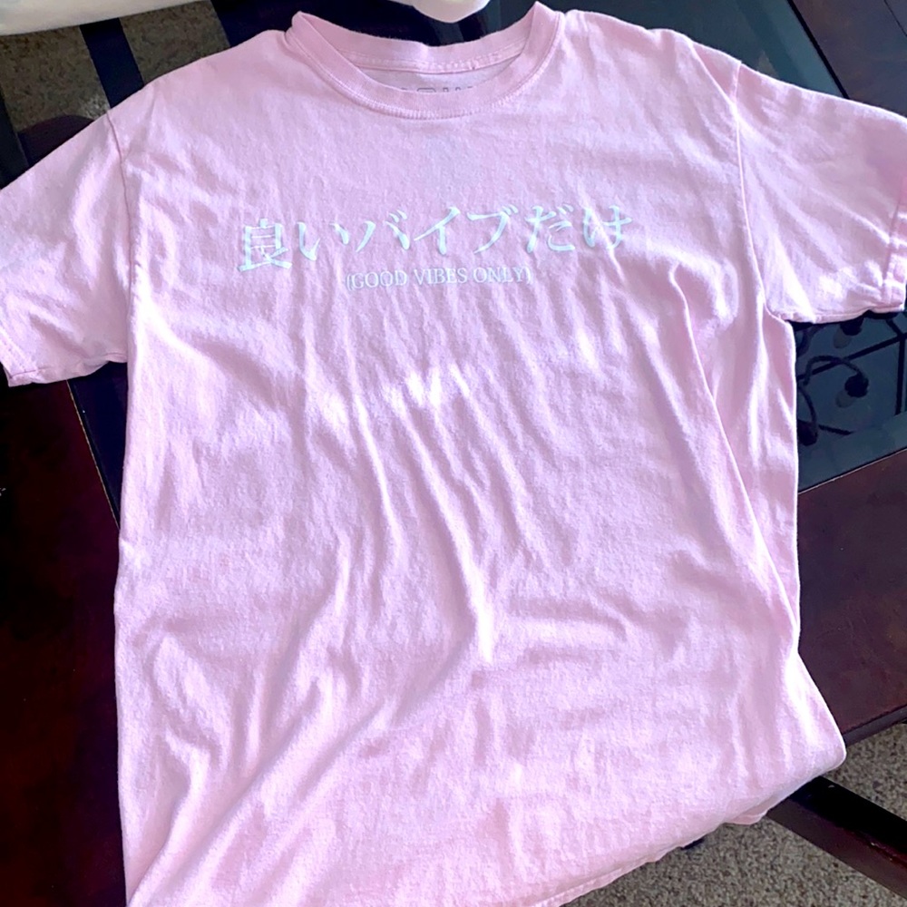 Pink T shirt for 10$.